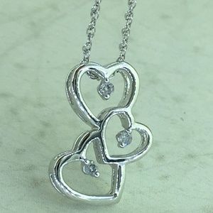 Ladies 10k white gold diamond heart charm & chain.